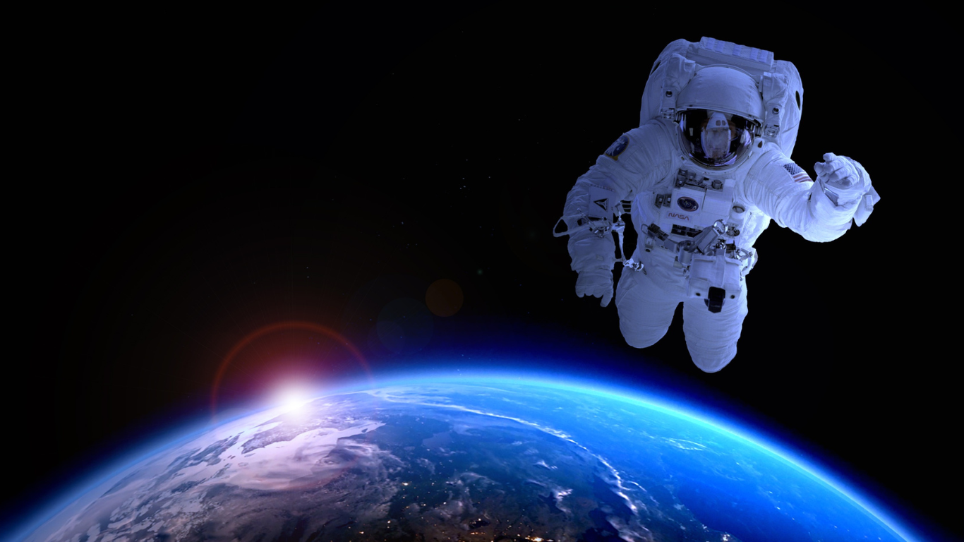 astronaut floating in space above the Earth