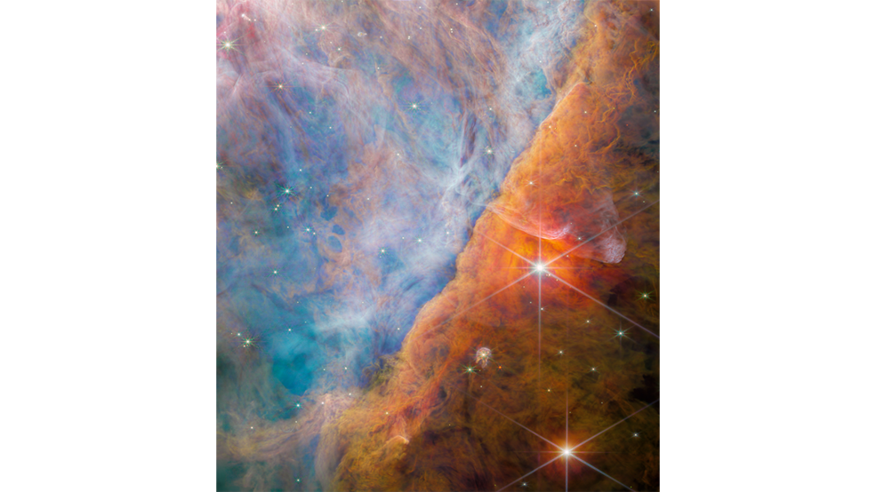 Billowy clouds divided from lower left to upper right. Left, the clouds are various shades of blue with orange wisps throughout. Right, clouds vary from bright orange-red to brown from left to right. Two bright stars with eight diffraction spikes.