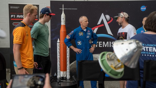 NASA astronaut Drew Feustel and SLS (Space Launch System) employees from Marshall Space Flight Center in Huntsville, Alabama, interact with racegoers during the Miami Grand Prix race weekend May 6-8.