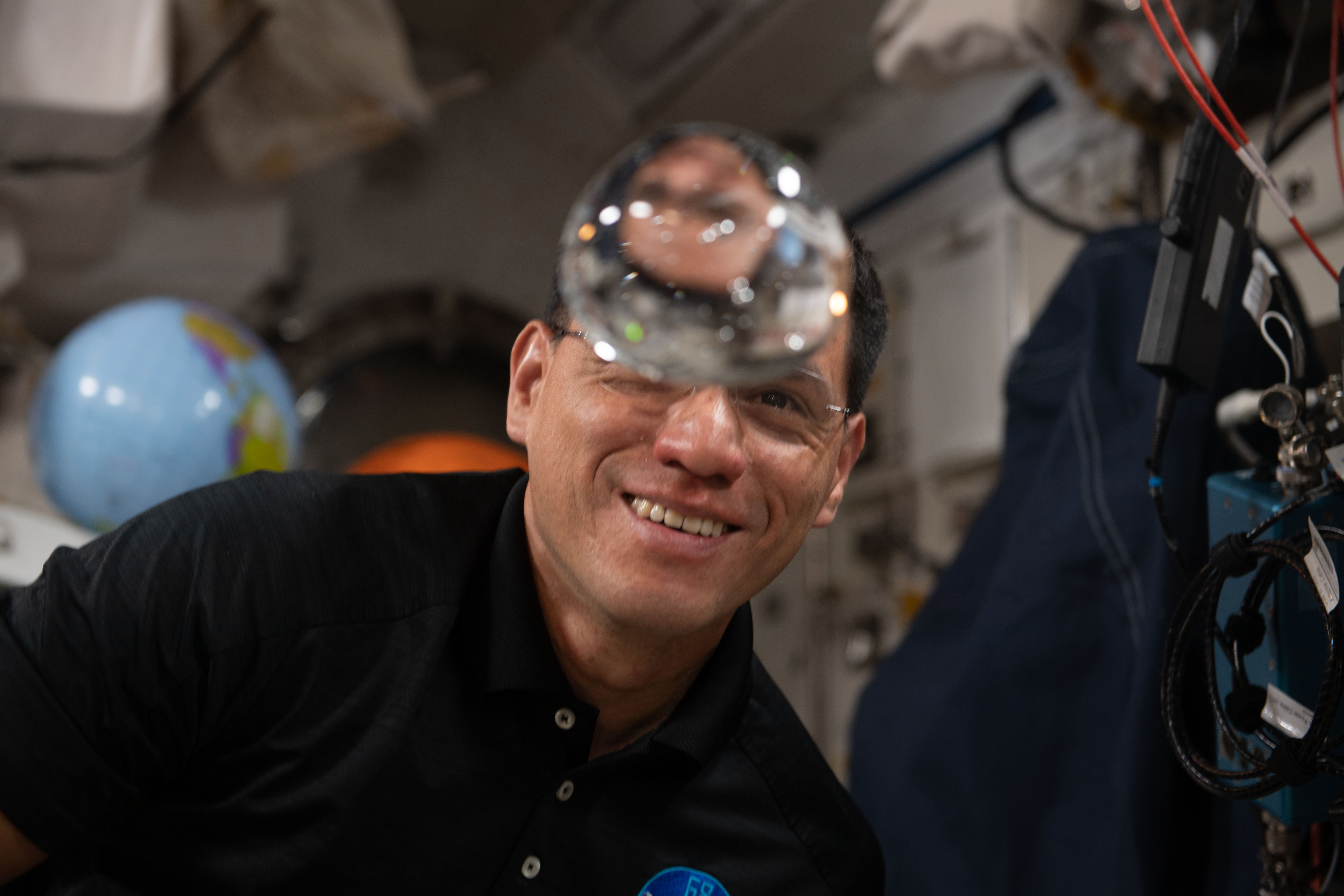 Houston We Have a Podcast: Ep. 293: NASA astronaut and Expedition 69 Flight Engineer Frank Rubio has fun with fluid physics as he observes the behavior of a free-flying water bubble inside the International Space Station's Kibo laboratory module.