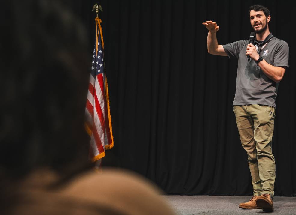 Joshua Moorhouse, an aerospace engineer in the Spacecraft & Vehicle System Department, discusses Virtual Environments Lab during his flash talk at the expo.