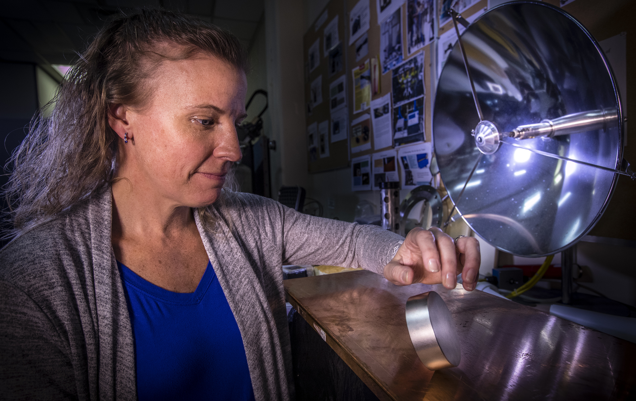 Principal Investigator Dr. Janine Captain demonstrates the effects of moving a magnet against metal in the Applied Physics Laboratory at NASA’s Kennedy Space Center in Florida.