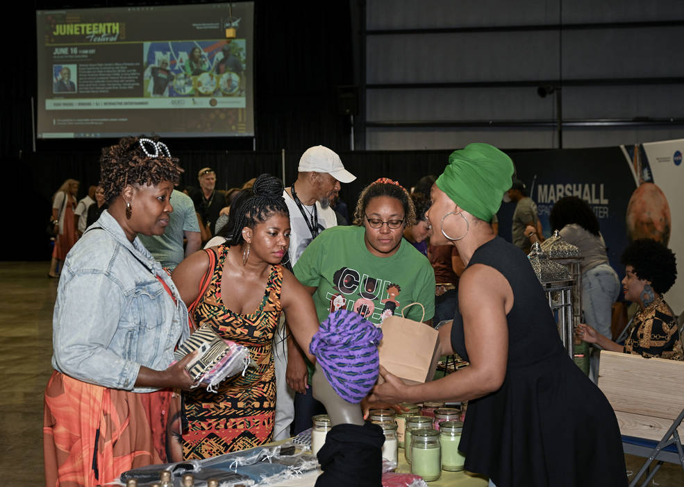 Marshall team members enjoy browsing apparel, cosmetics, and other vendors and exhibitors during the Juneteenth celebration.