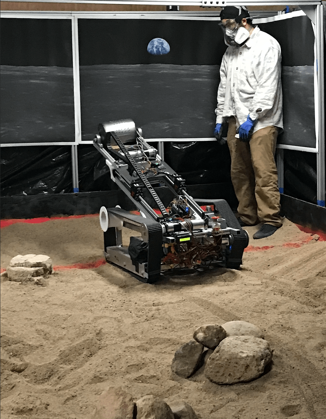 The New Mexico College of Mining and Technology robotic miner takes its first dig in the school’s mining arena.