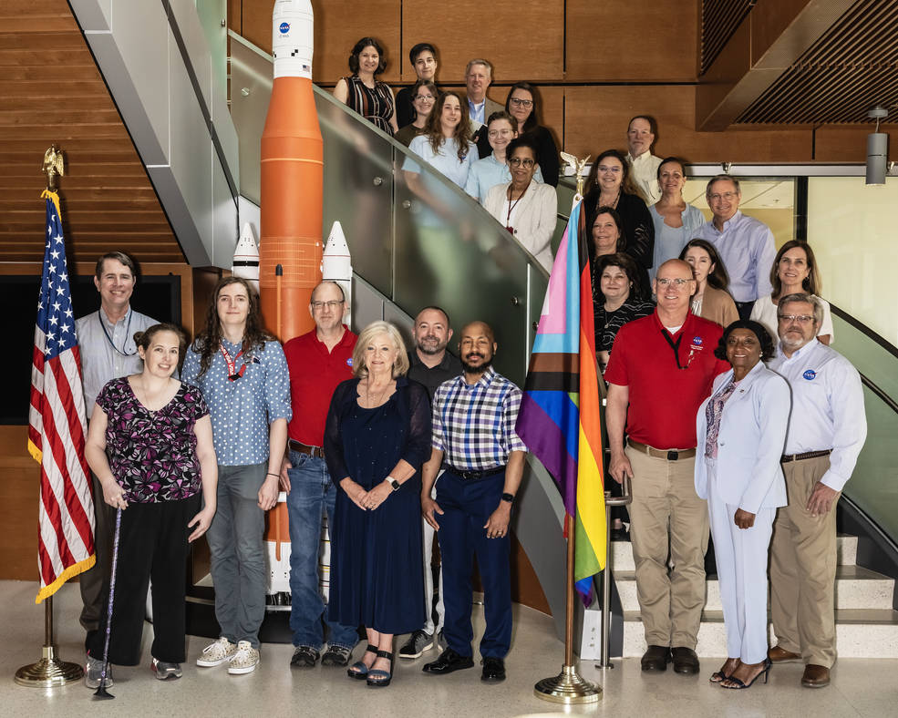 NASAs Marshall Space Flight Center Director Jody Singer and other senior leaders join members of Marshalls LGBTQI+ employee resource group (ERG), Out & Allied, for a group photo with the Progress Pride Flag.