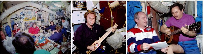 Left: Some of the Mir 25 and STS-91 crew members enjoy a meal together in Mir’s Base Block module. Middle: Astronaut Andrew S.W. Thomas enjoys playing a guitar that first arrived on Mir in 1995. Right: Mir 25 commander Talgat A. Musabayev, right, plays the guitar as STS-91 commander Charles J. Precourt holds the sheet music.
