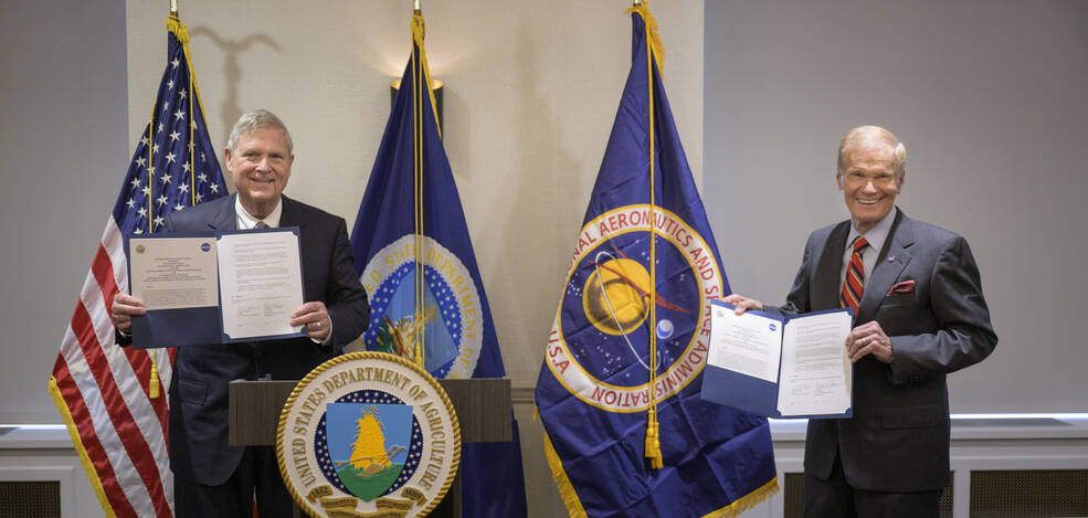 U.S. Secretary of Agriculture Thomas Vilsack, left, and NASA Administrator Bill Nelson, pose for a photograph after having signed a memorandum of understanding, Wednesday, June 21, 2023, at the USDAs Jamie L. Whitten Building in Washington.