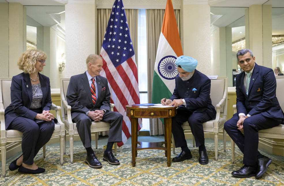 Indian Ambassador Taranjit Sandhu signs the Artemis Accords.