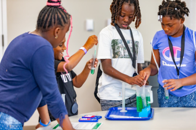 Students conduct experiments at Neighborhood Science