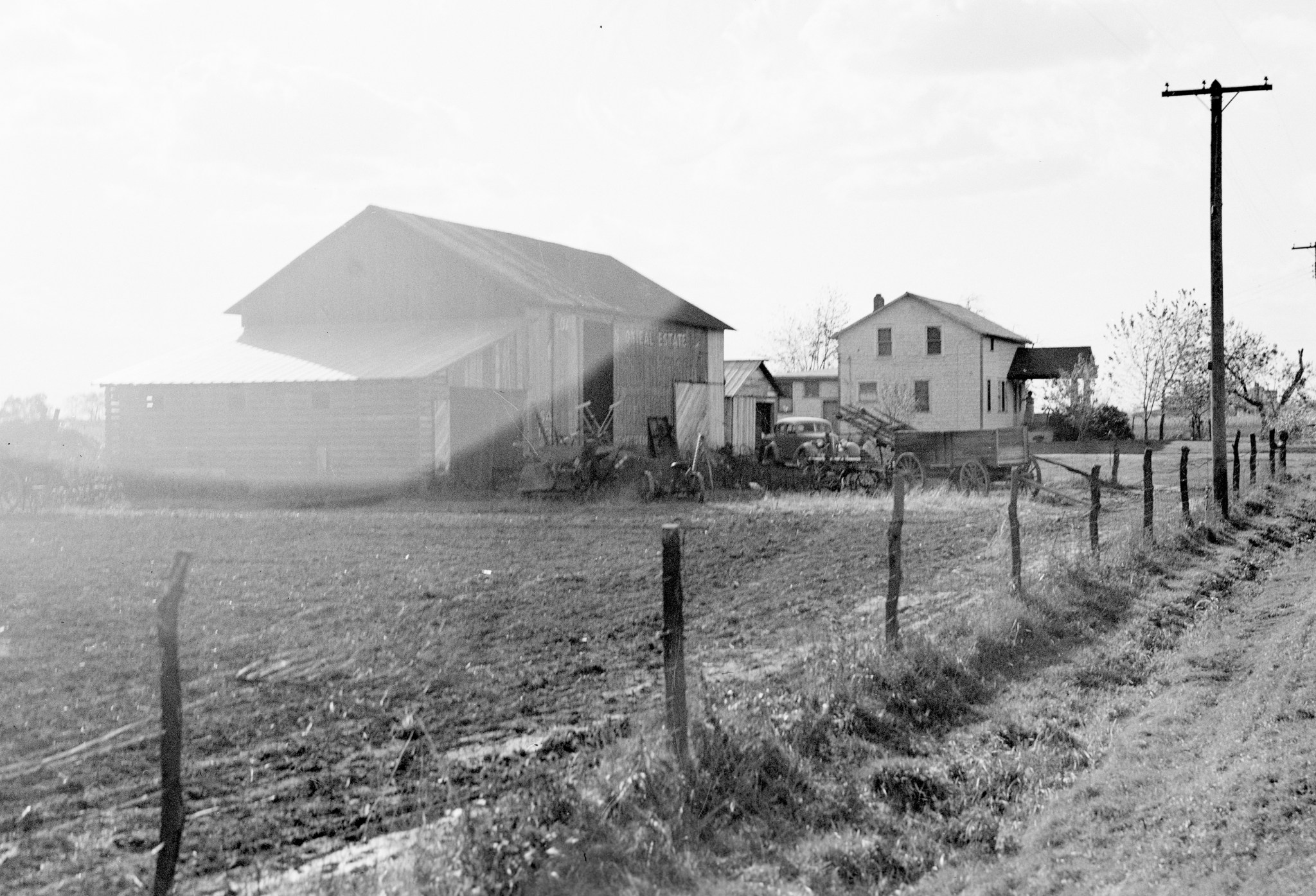 Farm house and fields.