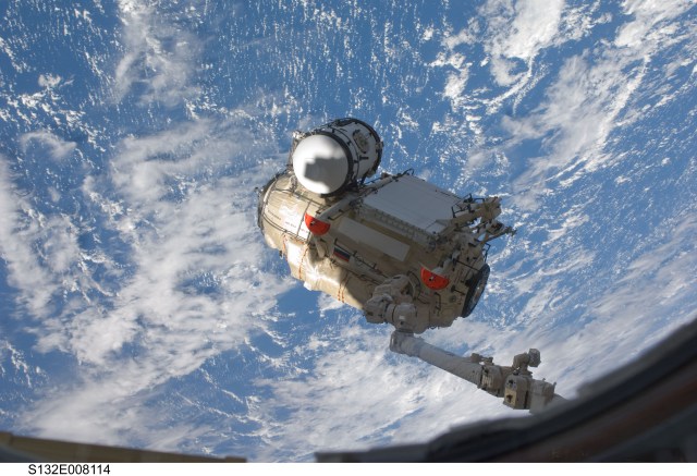 The Canadarm2 robotic arm removed Rassvet from space shuttle Atlantis' payload bay and installed it on the station on May 18, 2010.