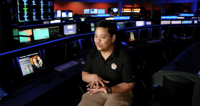 NASA-JPL engineer Al Chen sitting in a room with monitors