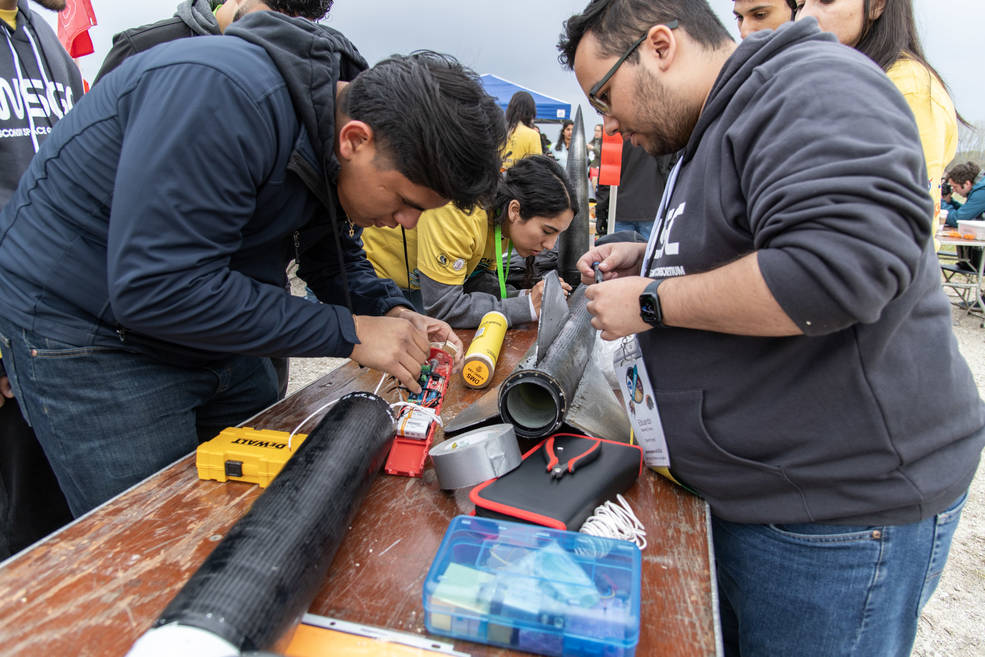 Teams make final preparations ahead of launching their rockets during the 14th First Nations Launch High-Power Rocket Competition at the Richard Bong State Recreational Area in Wisconsin.