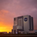 The Vehicle Assembly Building is seen at sunset as preparations continue for the NASA’s SpaceX Demo-2 mission.