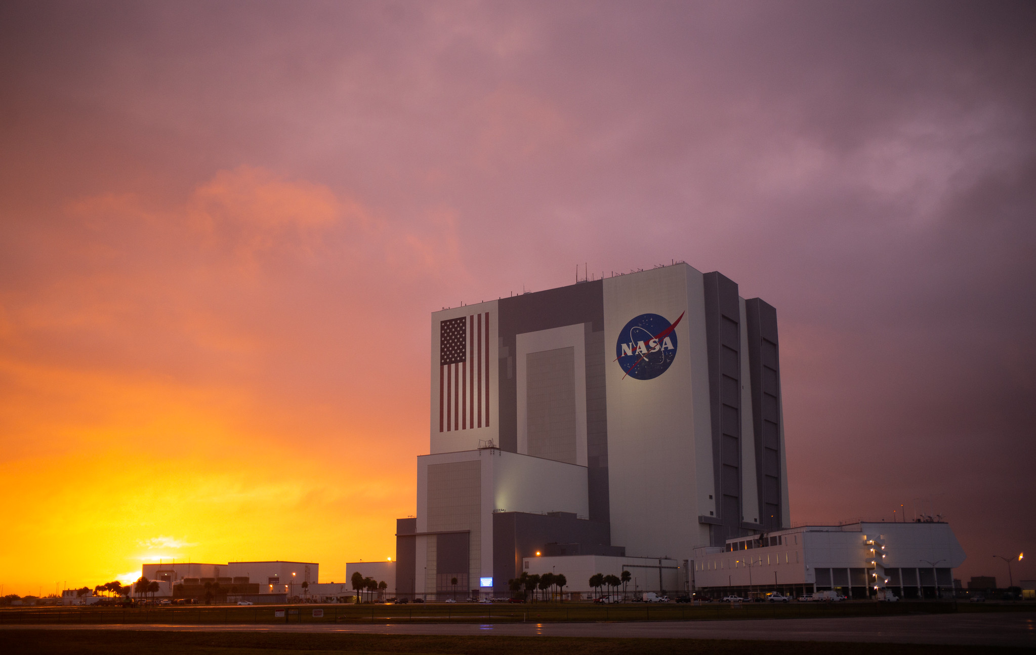 The Vehicle Assembly Building is seen at sunset as preparations continue for the NASA’s SpaceX Demo-2 mission.