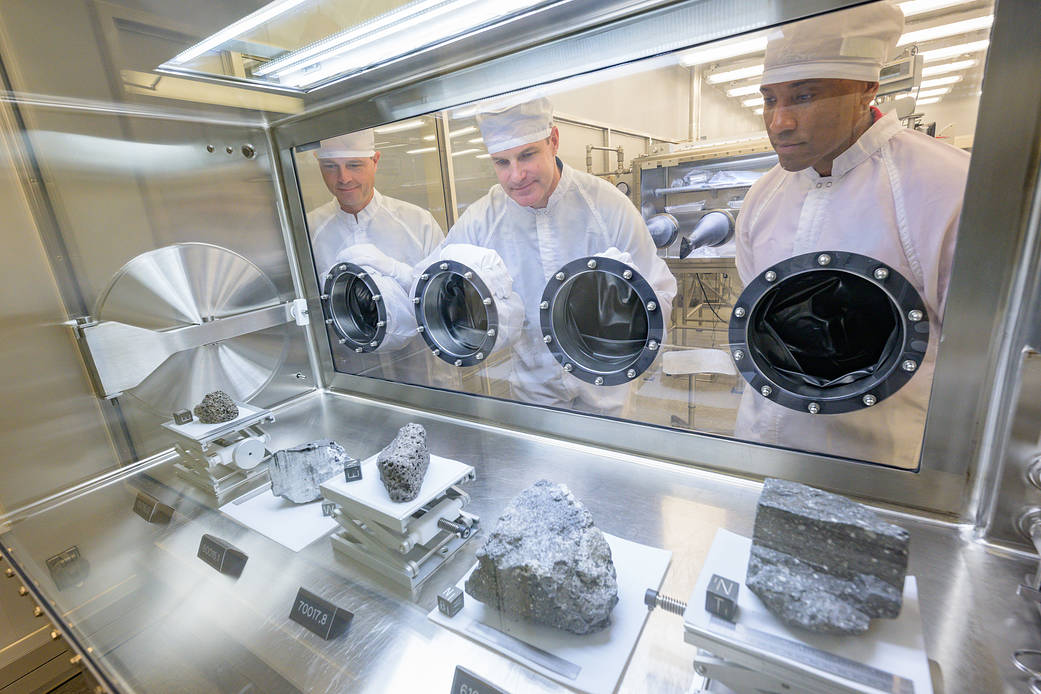 Members of the Artemis II crew receive a lesson on lunar fundamentals in the Apollo Lunar Lab at NASA's Johnson Space Center in Houston, Texas on May 9, 2023.