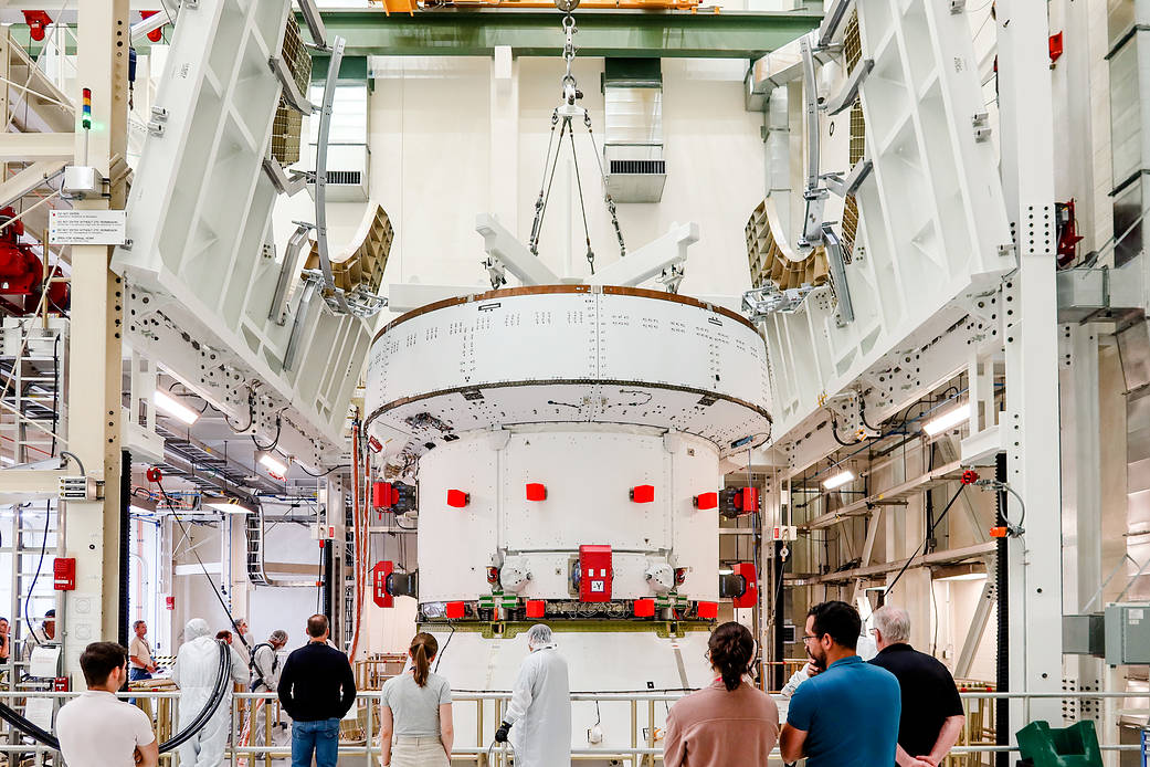 The service module for the Artemis II Orion spacecraft was moved into the Final Assembly and System Testing (FAST) Cell inside the Operations and Checkout Building at NASA's Kennedy Space Center in Florida.