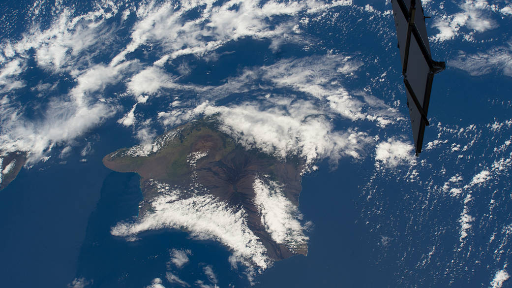 iss069e025331 (June 24, 2023) -- Clouds cover the Island of Hawaii, the youngest and largest of eight islands in the chain, as the International Space Station orbited 258 miles above the Pacific Ocean.