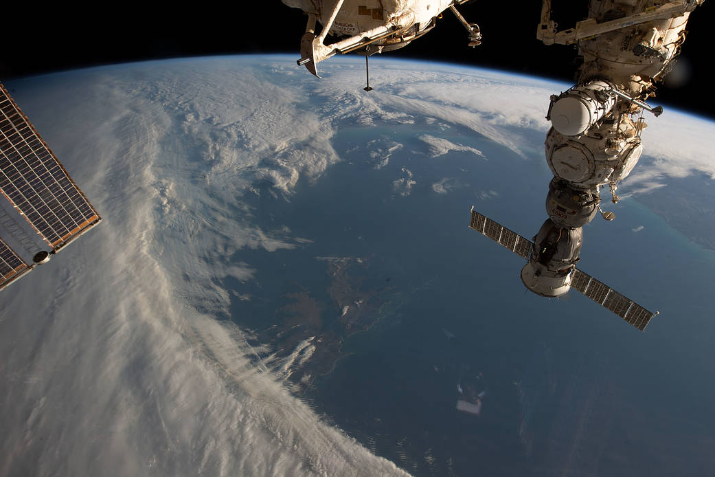 iss069e027359 (July 2, 2023) -- A set of remote South Atlantic islands, the Falkland Islands, peek through the clouds as the space station orbits 270 miles above Earth off the coast of South America.