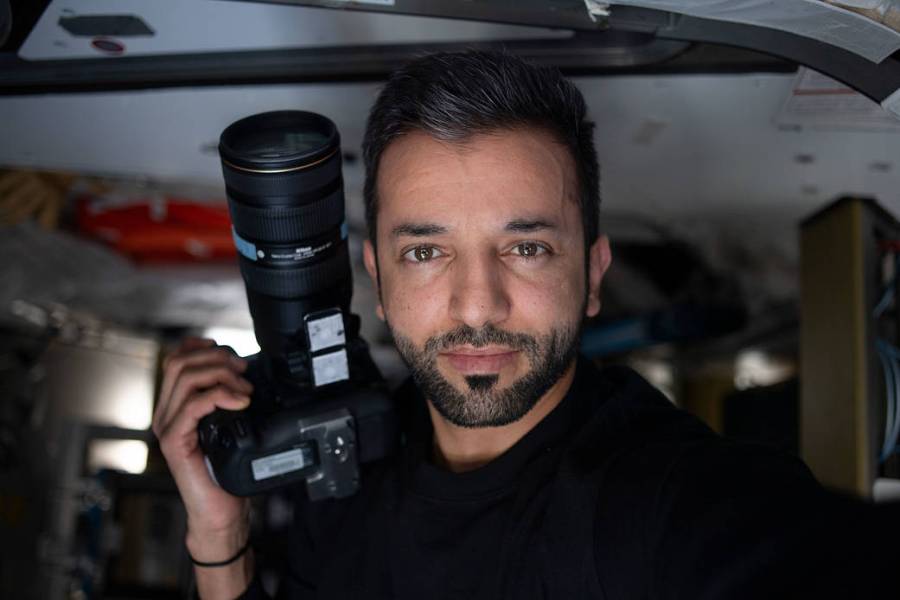 iss069e031084 (July 11, 2023) -- United Arab Emirates (UAE) Flight Engineer Sultan Alneyadi poses for a selfie while taking photos of Earth from the International Space Station.