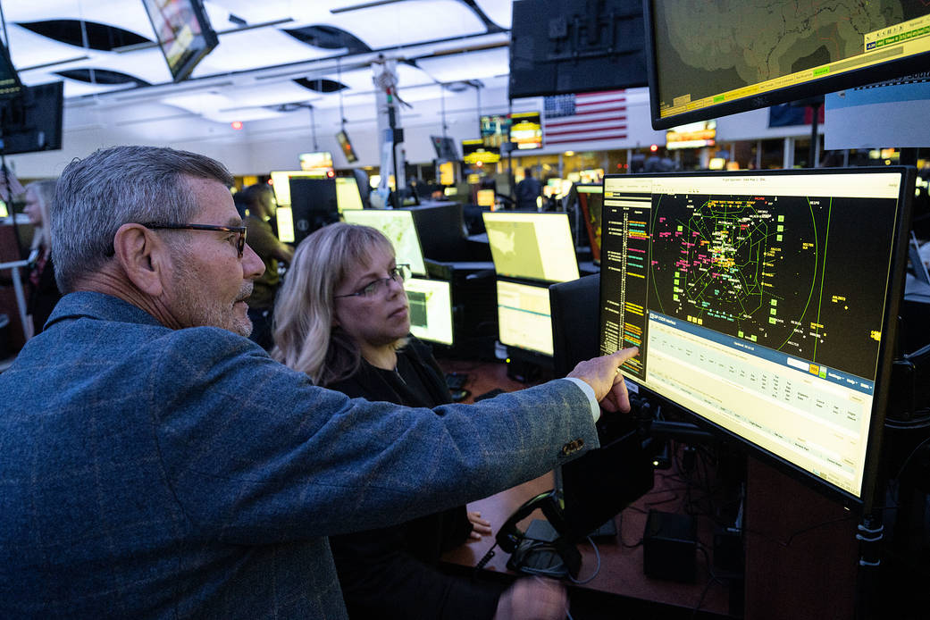 Computer screens at the Southwest Airlines Network Operations Control Center in Dallas, Texas, display NASA's Digital Information Platform Collaborative Digital Departure Reroute (CDDR) tool.