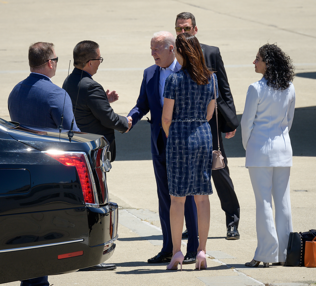 Center director at NASA’s Ames Research Center, Dr. Eugene Tu (left), greets President Joe Biden upon his arrival aboard Air Force One at Moffett Federal Airfield, located at Ames, on Monday, June 19, 2023.