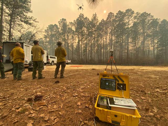 NASA researchers test a mobile air traffic kit for remotely operated Unmanned Aircraft Systems (UAS) in DeSoto National Forest in Mississippi. The mobile air traffic is being developed for use in wildfire operations.