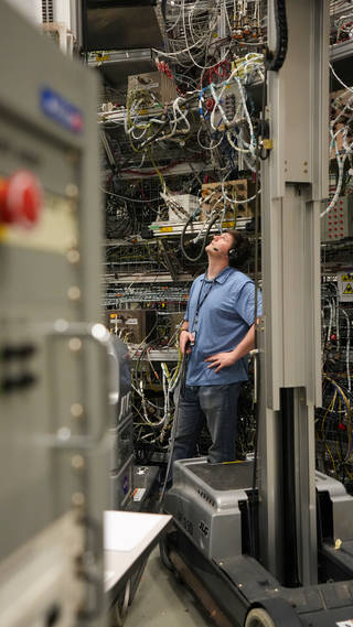 A software engineer evaluates the flight software and avionics configuration inside the Systems Integration Laboratory (SIL) at NASAs Marshall Space Flight Center in Huntsville, Alabama. Engineers will soon begin integrated system testing in the SIL.