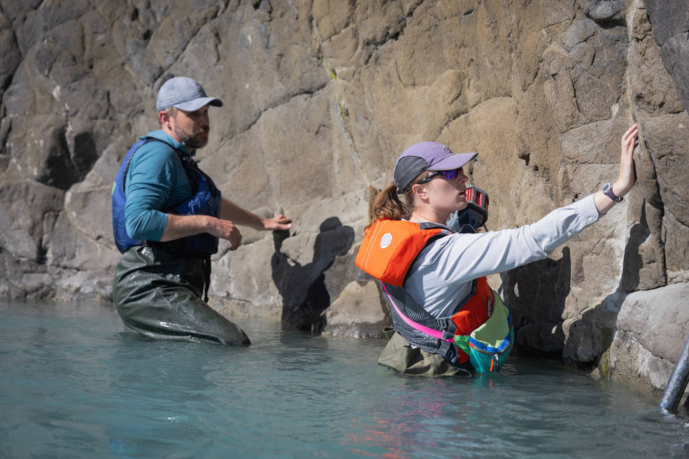 Researchers install sensors in a New Zealand river in April as part of calibration-validation activities for the international SWOT satellite.