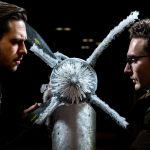 Curtis Flack (left) and Paul von Hardenberg inspecting the ice that formed on the proprotor model.