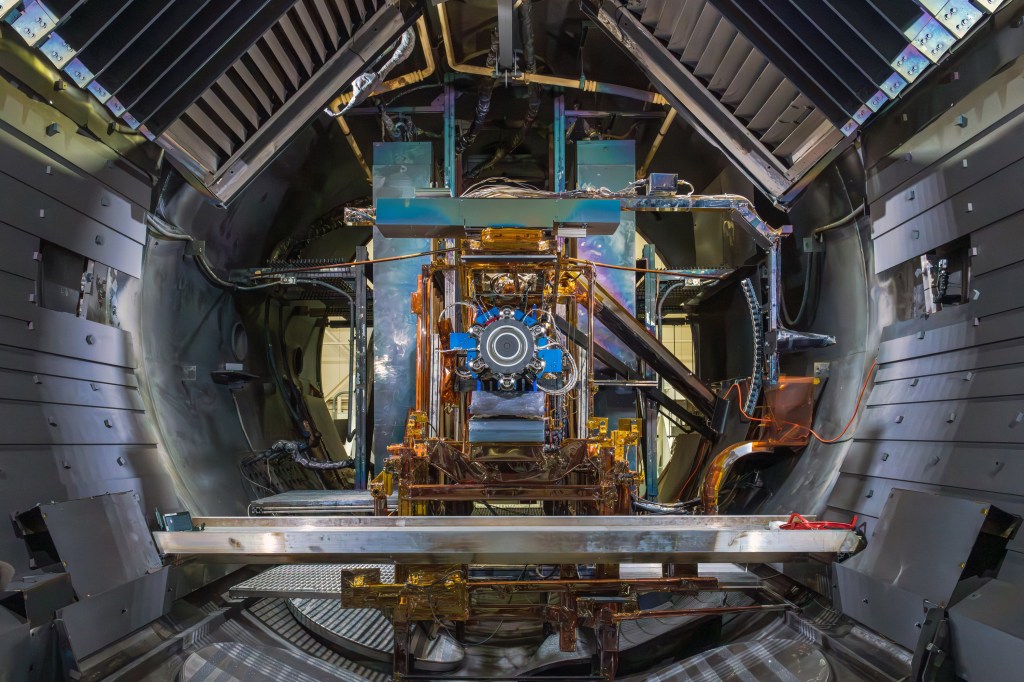 The Advanced Electric Propulsion System qualification thruster inside one of the vacuum chambers at NASA Glenn’s Electric Propulsion and Power Laboratory.