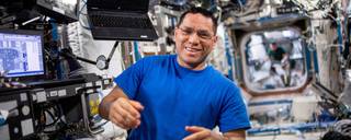NASA astronaut and Expedition 69 Flight Engineer Frank Rubio poses for a portrait while working inside the International Space Stations Destiny laboratory module.