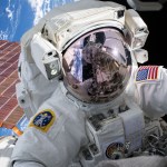 NASA astronaut Andrew Morgan conducts a spacewalk at the Port- 6 (P6) truss structure work site to upgrade International Space Station power systems.
