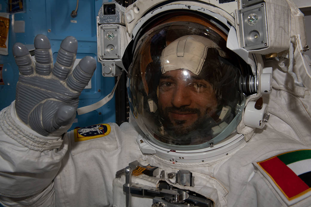 Astronaut Sultan Alneyadi tries on his spacesuit ahead of a spacewalk