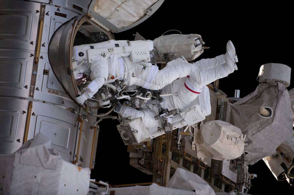 Spacewalkers Stephen Bowen and Sultan Alneyadi exit the Quest airlock