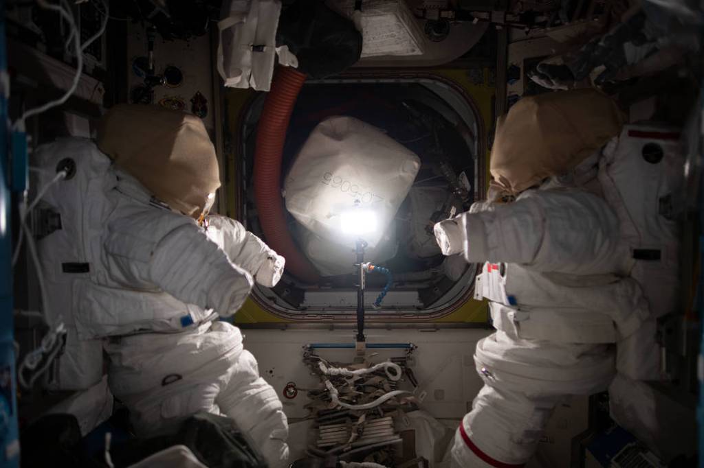 Spacesuits pictured inside the Quest airlock