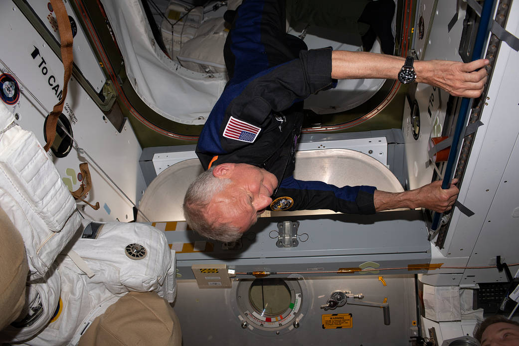 Ax-2 Pilot John Shoffner enters the space station