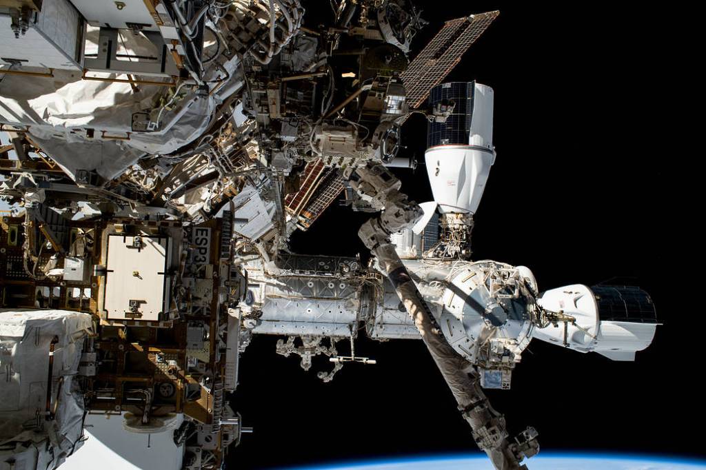 Two SpaceX Dragon vehicles are pictured docked to the space station