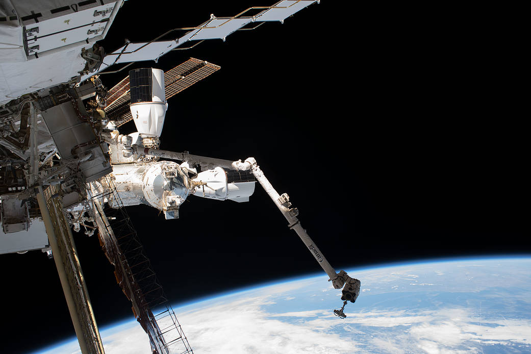 View of the space station and the SpaceX Dragon vehicles