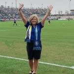 NASA Marshall Space Flight Center Director Jody Singer waves to a crowd of nearly 6,000 at The Wicks Family Field at Joe Davis Stadium in Huntsville on July 16.