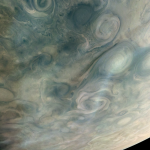 On Mar. 1, 2023, NASA's Juno mission completed its 49th close flyby of Jupiter. As the spacecraft flew low over the giant planet's cloud tops, its JunoCam instrument captured bands of high-altitude haze forming above cyclones in an area known at Jet N7.