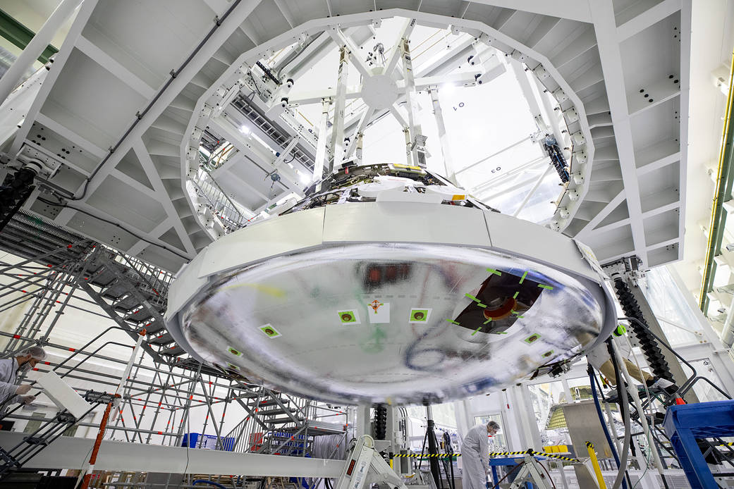 Teams install the heat shield on the Artemis II Orion spacecraft inside the high bay of the Neil Armstrong Operations and Checkout Building at NASA’s Kennedy Space Center in Florida on June 22, 2023.