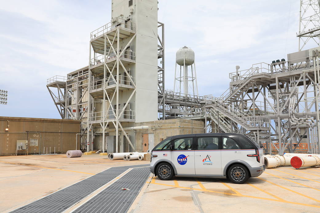 Three specially designed, fully electric, environmentally friendly crew transportation vehicles for Artemis missions arrived at NASA’s Kennedy Space Center in Florida on July 11, 2023. One of the zero-emission vehicles is shown here at Launch Pad 39B.