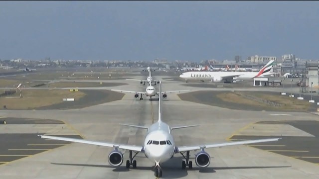 taxiing planes en route to runway