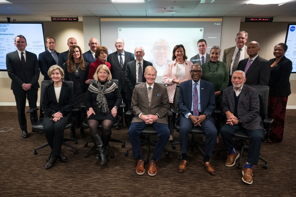 The NASA Advisory Council poses for a group photo on Tuesday, Jan. 17, 2023 at the Mary W. Jackson NASA Headquarters building in Washington.