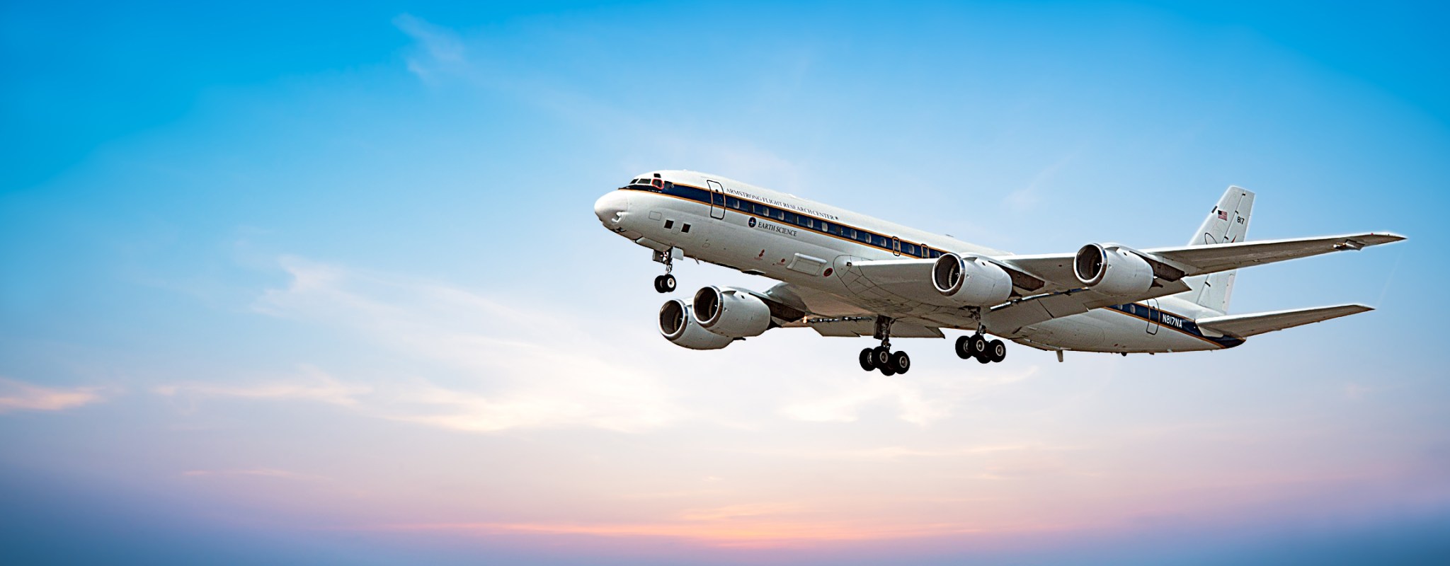 Photo composite showing NASA's 4-engine DC-8 jet flying through a simulated sky.