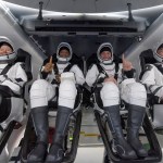 NASA astronauts Shannon Walker, left, Victor Glover, Mike Hopkins, and Japan Aerospace Exploration Agency (JAXA) astronaut Soichi Noguchi, right are seen inside the SpaceX Crew Dragon Resilience spacecraft onboard the SpaceX GO Navigator recovery ship shortly after having landed in the Gulf of Mexico off the coast of Panama City, Florida, Sunday, May 2, 2021.
