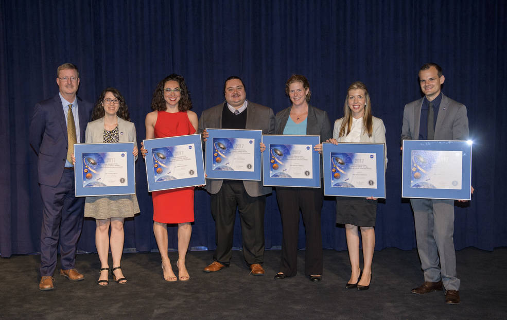 PECASE 2017 Winners (left to right): Dr. David Draper, NASA Deputy Chief Scientist; Giada Arney; Erika Hamden; Evan Pineda; Abigail Vieregg; Kelly Stephani; Jonathan Sauder; Mark Blenner (not shown)