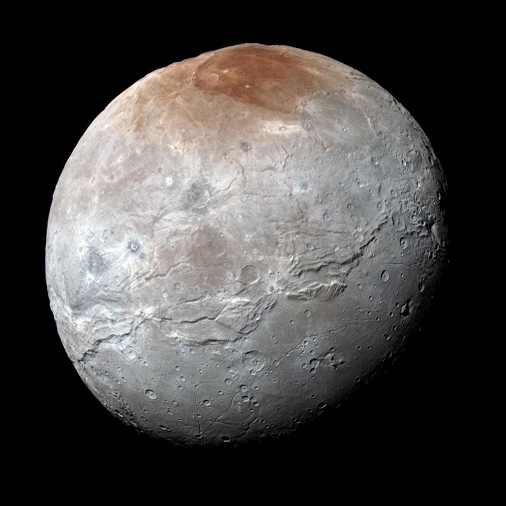 NASA's New Horizons captured this high-resolution enhanced color view of Charon just before closest approach on July 14, 2015.