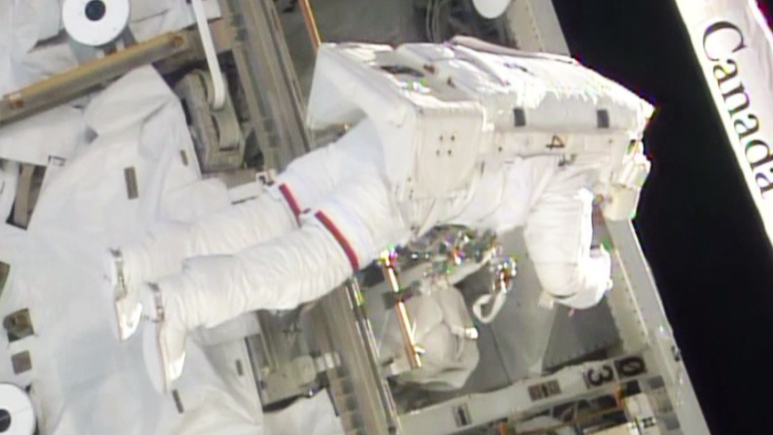 NASA Spacewalker Rick Mastracchio works outside the International Space Station to replace a failed Multiplexer/Demultiplexer (MDM) back up computer.